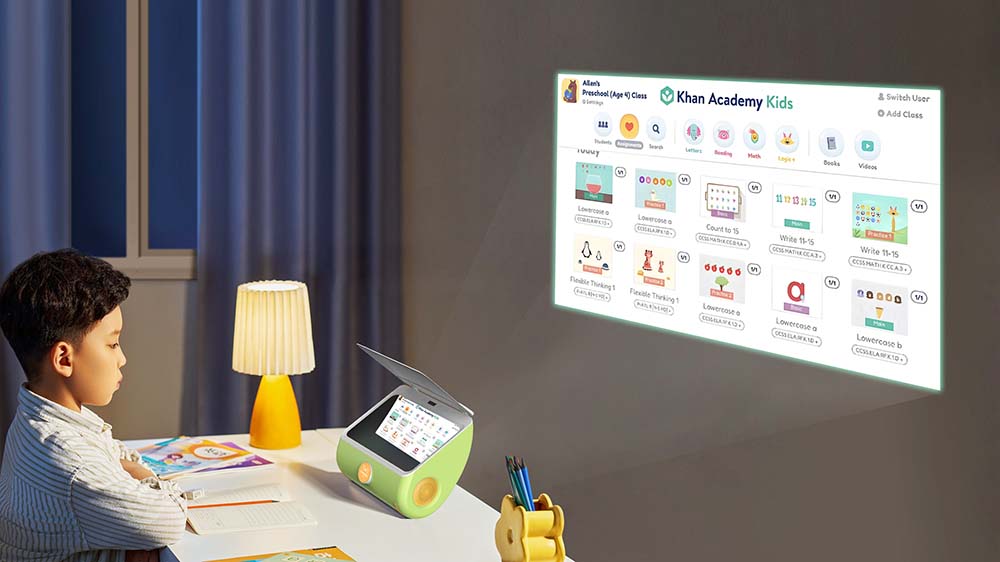 A child learning at a desk with the MAXIGHT Kid Edition