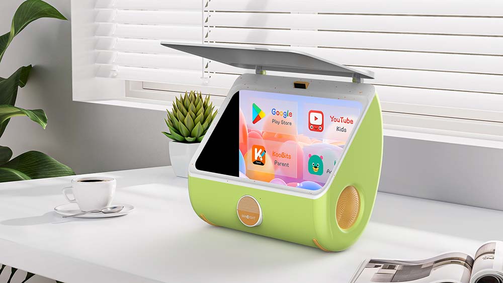 MAXIGHT Kid Edition, a green portable unit, open on a white desk